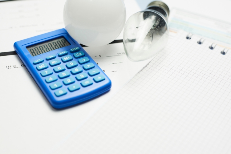 calculator papers and bulb focus