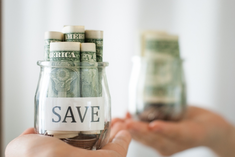 currency in jar focus
